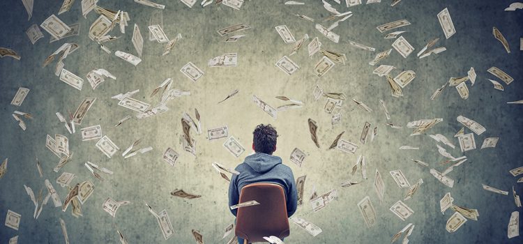 Vom Hobby zum Einkommen – Wie du online ein profitables Business aufbaust Man Sitting On Chair In Front Of A Wall Under Money Rain